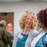 Attendees mingling prior to event start 32